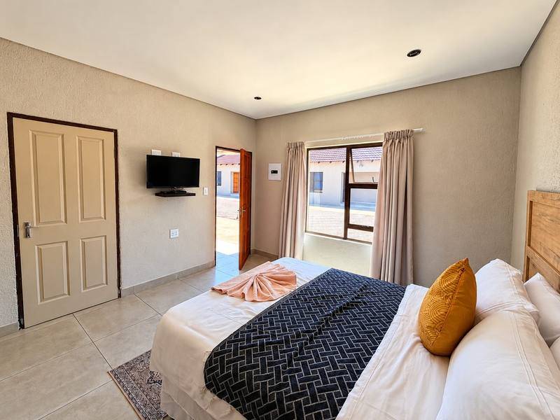 Outside en-suite room with a double bed and its own entrance